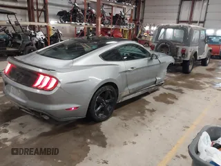 2021 Ford Mustang EcoBoost with VIN 1FA6P8TH1M5127800, listed as a IAAI auction lot 41625544 with 82,531 mi miles and . Bid and sale history available at carsss.com. Image 4.