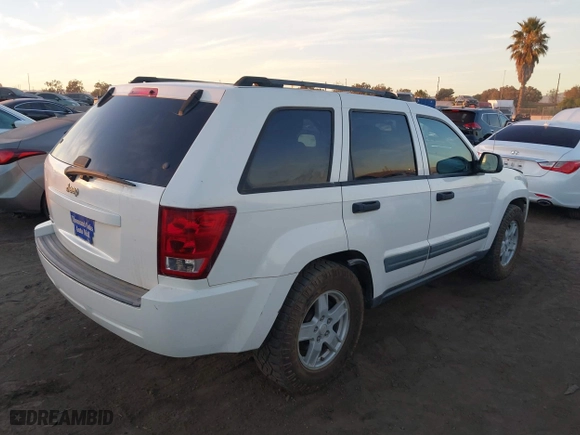 2006 Jeep Grand Cherokee Laredo with VIN 1J8GS48K16C348315, listed as a IAAI auction lot 41062772 with 239,662 mi miles. Bid and sale history available at carsss.com. Image 4.