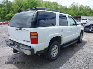2003 Chevrolet Tahoe Z71 z VIN 1GNEK13Z23R230226, wystawiony jako IAAI lot #42252874 z przebiegiem 251 268 mil mil oraz . Historia ofert i sprzedaży dostępna na DreamBid. Obrazek 4.