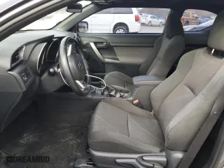 2011 Scion tC with VIN JTKJF5C71B3017022, listed as a Copart auction lot 52859865 with 220,603 mi miles and Salvage Title. Bid and sale history available at carsss.com. Image 7.