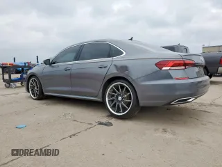 2020 Volkswagen Passat SE z VIN 1VWSA7A38LC010962, wystawiony jako Copart lot #57520325 z przebiegiem 76 566 mil mil oraz Czysty tytuł • Clean title. Historia ofert i sprzedaży dostępna na DreamBid. Obrazek 2.