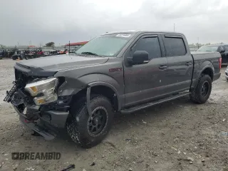 2016 Ford F-150 XLT with VIN 1FTEW1EFXGKF18400, listed as a Copart auction lot 55776805 with 128,771 mi miles and Salvage title. Bid and sale history available at DreamBid. Image 1.