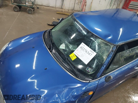 2012 MINI Hardtop with VIN WMWSU3C55CT184924, listed as a IAAI auction lot 42276347 with 92,468 mi miles and . Bid and sale history available at DreamBid. Image 6.