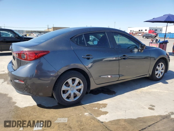 2015 Mazda 3 i SV with VIN JM1BM1T7XF1221460, listed as a Copart auction lot 76098874 with 105,542 mi miles and Clean Title. Bid and sale history available at DreamBid. Image 3.