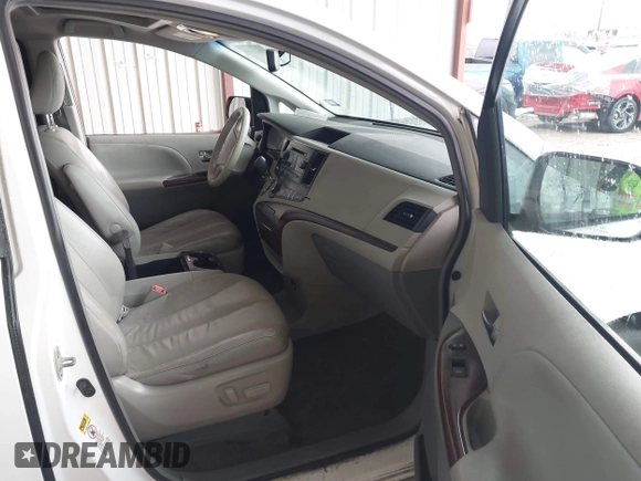 2014 Toyota Sienna XLE with VIN 5TDYK3DC6ES444121, listed as a IAAI auction lot 42110190 with 240,366 mi miles and . Bid and sale history available at DreamBid. Image 5.