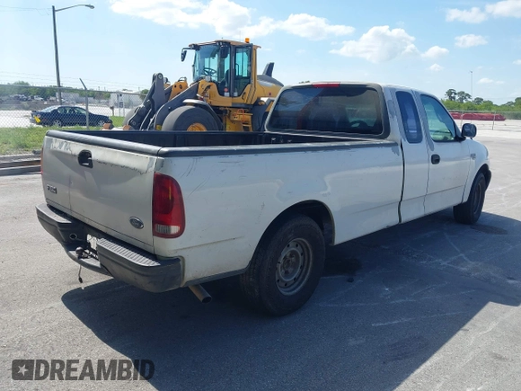 1999 Ford F-150 with VIN 1FTRX17W6XNB60822, listed as a IAAI auction lot 42310975 with Not provided miles and . Bid and sale history available at DreamBid. Image 4.