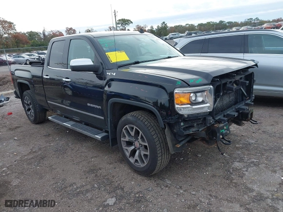 2014 GMC Sierra 1500 SLT with VIN 1GTV2VEJXEZ389280, listed as a IAAI auction lot 41370436 with 124,311 mi miles. Bid and sale history available at carsss.com. Image 1.