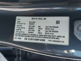 2022 Tesla Model 3 with VIN 5YJ3E1EA6NF144098, listed as a IAAI auction lot 41965360 with 75,597 mi miles. Bid and sale history available at carsss.com. Image 9.