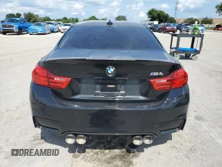 2016 BMW M4 with VIN WBS3R9C52GK338151, listed as a Copart auction lot 64882884 with Not Provided miles and Salvage Title. Bid and sale history available at carsss.com. Image 6.