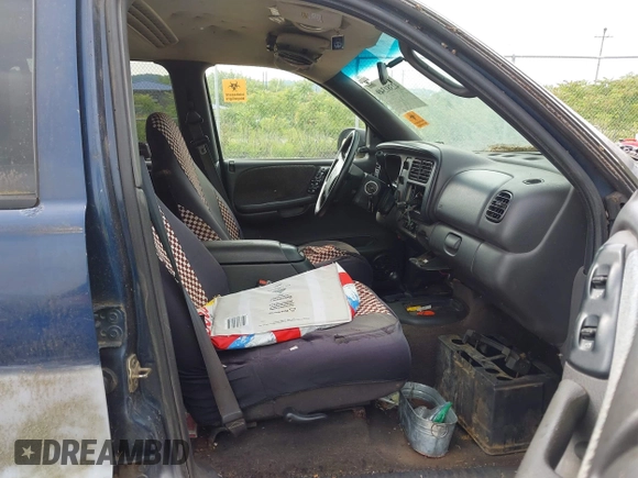 1999 Dodge Durango z VIN 1B4HS28Y0XF665181, wystawiony jako IAAI lot #42381349 z przebiegiem Nie podano mil oraz . Historia ofert i sprzedaży dostępna na DreamBid. Obrazek 5.