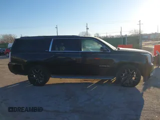 2015 GMC Yukon XL SLT with VIN 1GKS1HKC3FR250207, listed as a IAAI auction lot 41424234 with 183,233 mi miles. Bid and sale history available at carsss.com. Image 13.