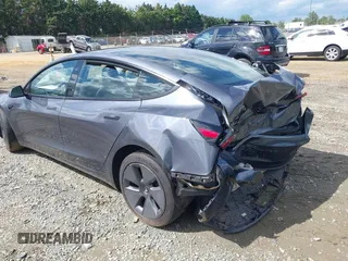 2023 Tesla Model 3 with VIN 5YJ3E1EA4PF515844, listed as a IAAI auction lot 42321123 with 46,683 mi miles and . Bid and sale history available at DreamBid. Image 3.