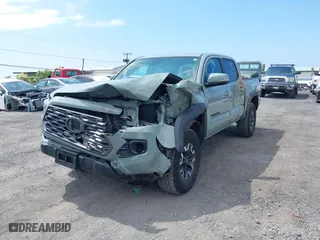 2023 Toyota Tacoma 4WD SR with VIN 3TYCZ5AN7PT145185, listed as a IAAI auction lot 41658297 with 23,647 mi miles. Bid and sale history available at carsss.com. Image 6.