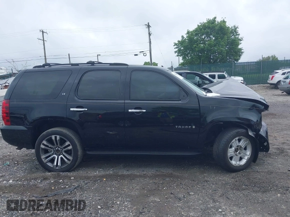 2007 Chevrolet Tahoe LT z VIN 1GNFK13017R210061, wystawiony jako IAAI lot #42256967 z przebiegiem Nie podano mil oraz . Historia ofert i sprzedaży dostępna na DreamBid. Obrazek 14.