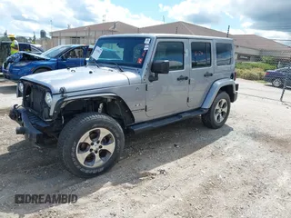 2018 Jeep Wrangler Unlimited Sahara with VIN 1C4BJWEGXJL806832, listed as a IAAI auction lot 42605892 with 90,535 mi miles and . Bid and sale history available at DreamBid. Image 17.