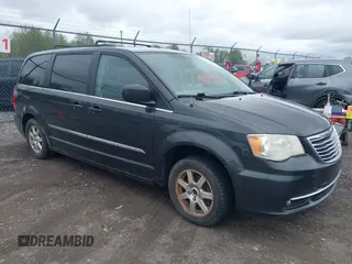2011 Chrysler Town & Country Touring with VIN 2A4RR5DG3BR634830, listed as a IAAI auction lot 42196981 with 137,489 mi miles and . Bid and sale history available at DreamBid. Image 1.