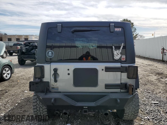 2014 Jeep Wrangler Unlimited Sport with VIN 1C4BJWDG3EL108151, listed as a Copart auction lot 49862315 with 104,417 mi miles and Salvage Title. Bid and sale history available at carsss.com. Image 6.