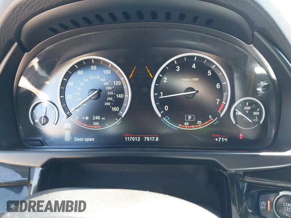 2014 BMW X5 xDrive50i with VIN 5UXKR6C57E0J72301, listed as a IAAI auction lot 39379887 with 117,012 mi miles. Bid and sale history available at carsss.com. Image 7.
