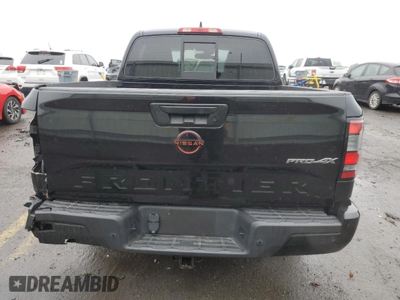 2022 Nissan Frontier Pro-4X z VIN 1N6ED1EK4NN686366, wystawiony jako Copart lot #57396085 z przebiegiem 50 753 mil mil oraz Szkoda całkowita • Salvage title. Historia ofert i sprzedaży dostępna na DreamBid. Obrazek 6.