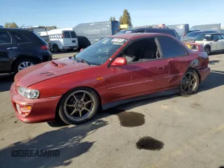 2000 Subaru Impreza RS with VIN JF1GM6751YG403064, listed as a Copart auction lot 80776534 with 210,097 mi miles and Salvage title. Bid and sale history available at DreamBid. Image 1.