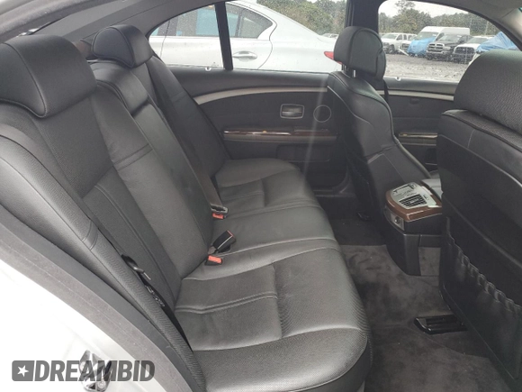 2004 BMW 7 Series 745i with VIN WBAGL634X4DP70421, listed as a Copart auction lot 73309744 with 123,457 mi miles and Salvage Title. Bid and sale history available at DreamBid. Image 10.