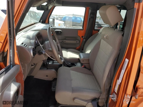 2010 Jeep Wrangler Unlimited Sport with VIN 1J4BA3H10AL223539, listed as a Copart auction lot 49852195 with 108,157 mi miles and Salvage Title. Bid and sale history available at carsss.com. Image 7.