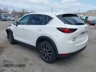 2018 Mazda CX-5 Touring with VIN JM3KFBCMXJ0353369, listed as a IAAI auction lot 41902554 with 154,104 mi miles and . Bid and sale history available at DreamBid. Image 3.