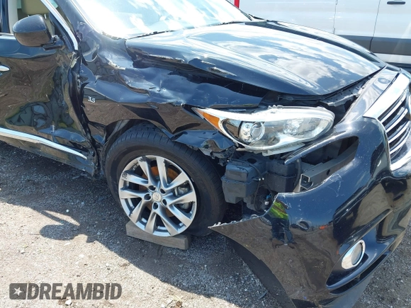 2015 Infiniti QX60 z VIN 5N1AL0MM3FC501878, wystawiony jako IAAI lot #42539150 z przebiegiem 224 239 mil mil oraz . Historia ofert i sprzedaży dostępna na DreamBid. Obrazek 6.