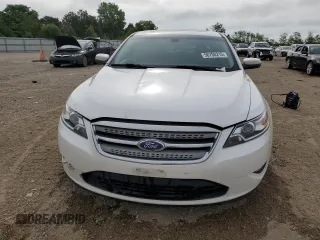2012 Ford Taurus SEL z VIN 1FAHP2EW8CG138653, wystawiony jako Copart lot #56750215 z przebiegiem 159 631 mil mil oraz Szkoda całkowita • Salvage title. Historia ofert i sprzedaży dostępna na DreamBid. Obrazek 5.