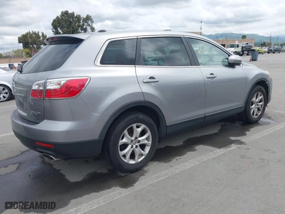 2011 Mazda CX-9 Touring with VIN JM3TB2CV0B0331326, listed as a IAAI auction lot 41988142 with 148,309 mi miles. Bid and sale history available at carsss.com. Image 4.