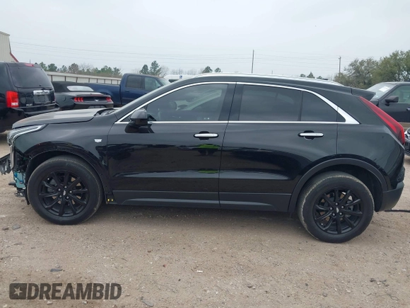 2023 Cadillac XT4 FWD Luxury with VIN 1GYAZAR49PF128552, listed as a IAAI auction lot 41806172 with 36,081 mi miles and . Bid and sale history available at carsss.com. Image 15.