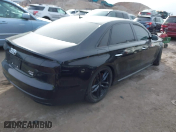2016 Audi A8 L 4.0T Sport with VIN WAU43AFDXGN005323, listed as a IAAI auction lot 41311344 with 84,000 mi miles. Bid and sale history available at carsss.com. Image 4.