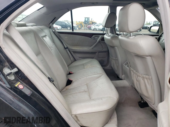 2000 Mercedes-Benz E-Class with VIN WDBJF65J5YB068297, listed as a Copart auction lot 69199004 with 236,751 mi miles and Salvage Title. Bid and sale history available at carsss.com. Image 10.
