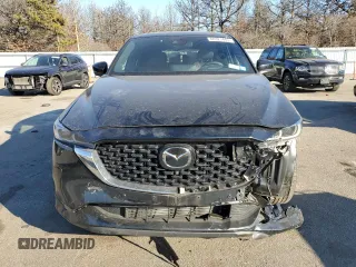 2023 Mazda CX-5 Signature with VIN JM3KFBXYXP0130139, listed as a Copart auction lot 88321445 with 22,911 mi miles and Salvage Title. Bid and sale history available at carsss.com. Image 5.