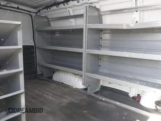 2021 Chevrolet Express Cargo Van with VIN 1GCWGAFP0M1206242, listed as a IAAI auction lot 42043866 with 148,087 mi miles. Bid and sale history available at carsss.com. Image 8.