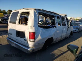 2001 Ford Econoline Passenger XL with VIN 1FMRE11LX1HA66495, listed as a Copart auction lot 70438864 with 306,671 mi miles and Salvage Title. Bid and sale history available at carsss.com. Image 3.
