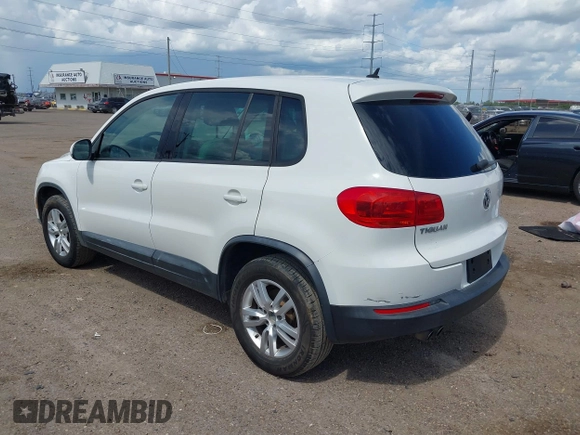 2012 Volkswagen Tiguan SE with VIN WVGAV7AX4CW579341, listed as a IAAI auction lot 42618922 with 118,855 mi miles and . Bid and sale history available at DreamBid. Image 3.