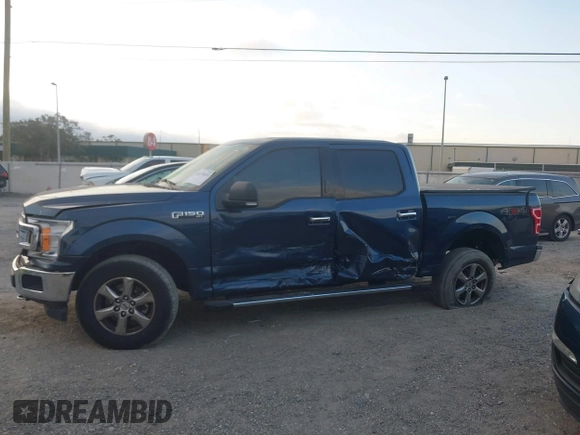 2018 Ford F-150 XL with VIN 1FTEW1EG8JFE43110, listed as a IAAI auction lot 41079835 with 118,188 mi miles. Bid and sale history available at carsss.com. Image 14.