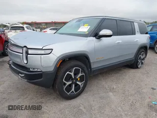 2024 Rivian R1S Adventure with VIN 7PDSGABA9RN043583, listed as a IAAI auction lot 41617148 with Not Provided miles. Bid and sale history available at carsss.com. Image 2.