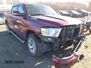 2019 Ram 1500 Big Horn/Lone Star with VIN 1C6SRFFT2KN647936, listed as a IAAI auction lot 41294403 with 123,834 mi miles. Bid and sale history available at carsss.com. Image 20.