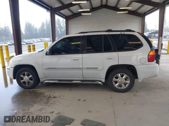 2003 GMC Envoy SLE with VIN 1GKDT13SX32319740, listed as a IAAI auction lot 41923578 with 210,811 mi miles. Bid and sale history available at carsss.com. Image 14.