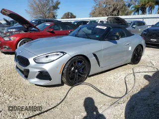 2022 BMW Z4 sDrive30i with VIN WBAHF3C03NWX80169, listed as a Copart auction lot 74791084 with 0 mi miles and Salvage Title. Bid and sale history available at carsss.com. Image 1.