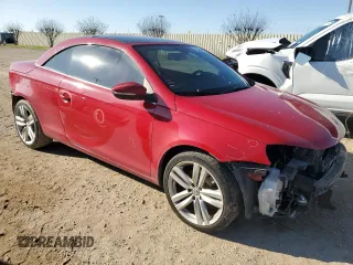 2012 Volkswagen Eos Lux with VIN WVWFW7AH7CV001093, listed as a Copart auction lot 85584384 with 105,464 mi miles and Salvage Title. Bid and sale history available at DreamBid. Image 4.