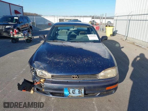 1994 Toyota Camry LE with VIN 4T1SK12EXRU374215, listed as a IAAI auction lot 41581093 with 80,397 mi miles. Bid and sale history available at carsss.com. Image 12.