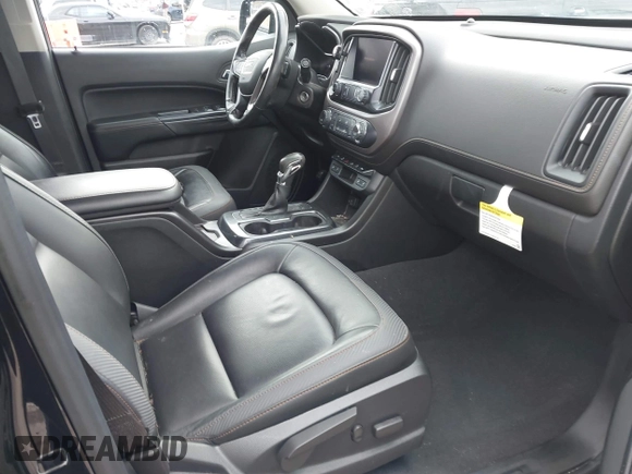 2022 GMC Canyon 4WD AT4 with VIN 1GTG6FEN0N1249453, listed as a IAAI auction lot 41513689 with 44,285 mi miles and . Bid and sale history available at carsss.com. Image 5.