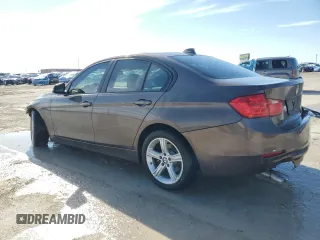 2015 BMW 3 Series 328i with VIN WBA3A5G58FNS88853, listed as a Copart auction lot 42785375 with 129,918 mi miles and Salvage title. Bid and sale history available at DreamBid. Image 2.