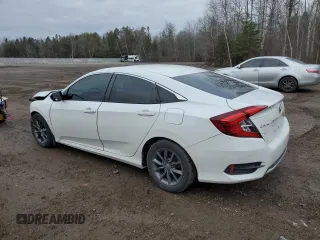 2021 Honda Civic Sedan EX with VIN 2HGFC2F7XMH011267, listed as a Copart auction lot 84063544 with 90,057 mi miles and Salvage Title. Bid and sale history available at carsss.com. Image 2.