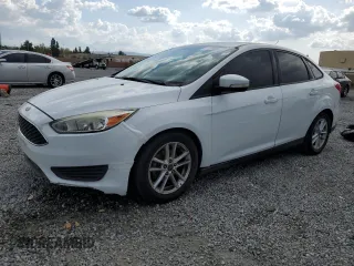 2016 Ford Focus SE with VIN 1FADP3F21GL284681, listed as a Copart auction lot 51140975 with 141,704 mi miles and Salvage Title. Bid and sale history available at DreamBid. Image 1.
