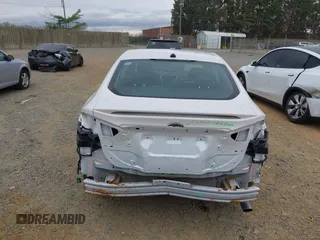 2013 Ford Fusion Titanium Hybrid with VIN 3FA6P0RU5DR357469, listed as a IAAI auction lot 41969315 with 215,732 mi miles. Bid and sale history available at carsss.com. Image 6.