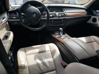 2012 BMW X5 35i with VIN 5UXZV4C56CL754643, listed as a Copart auction lot 55970125 with 150,584 mi miles and Salvage title. Bid and sale history available at DreamBid. Image 8.